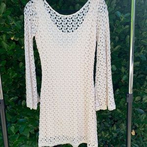 Intricate crochet dress with wide sleeves